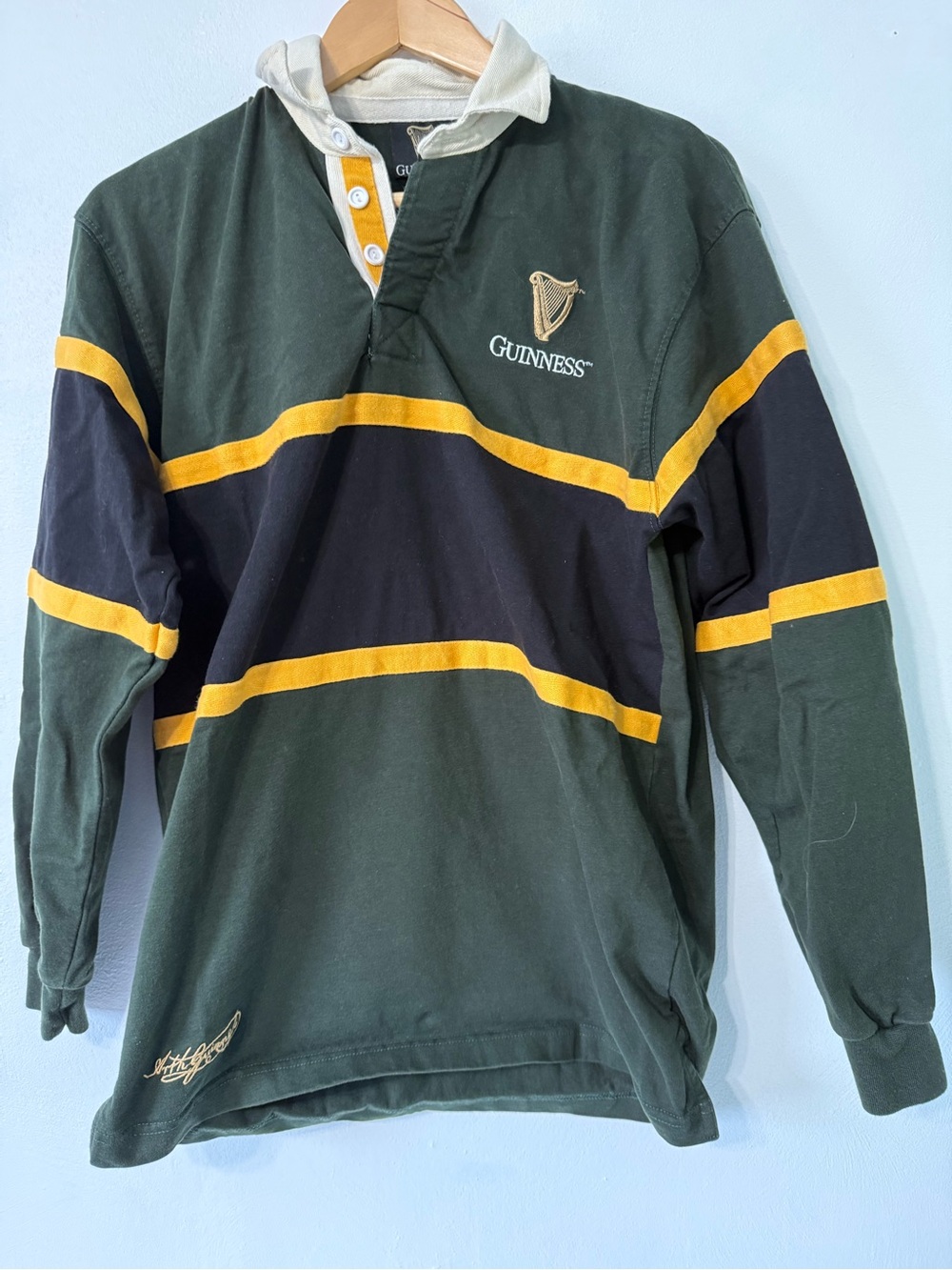 Guinness Green Black Rugby Top with Yellow Stripes